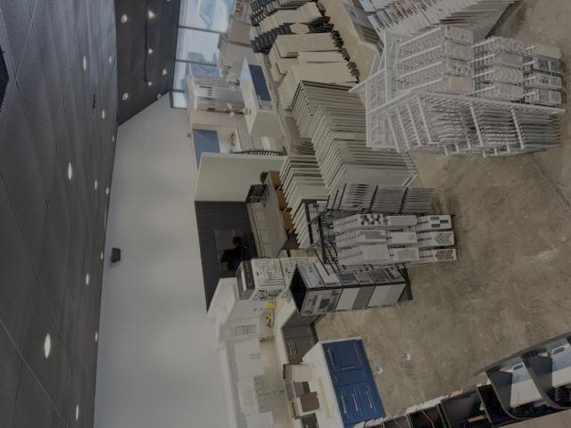 Main Street Kitchen & Flooring showroom — flooring samples wall